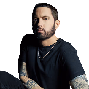 Eminem wearing a black t-shirt and a gold chain, with tattoos visible on his arms.